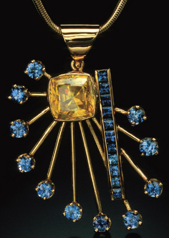 Stibiotantalite pendant with benitoites, 4.5 cm high. B. Gray coll. J. Scovil photo