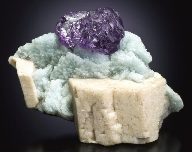Fluorite with albite and microcline, 8.2 cm wide. Spirifer collection. J. Scovil photo.
