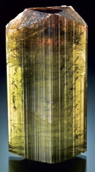 Doubly terminated liddicoatite crystal from one of the side pockets showing different colors and habit, 6.4 cm in length. Spirifer collection. J. Scovil photo